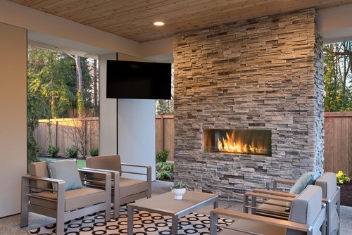 Outdoor living area with fireplace